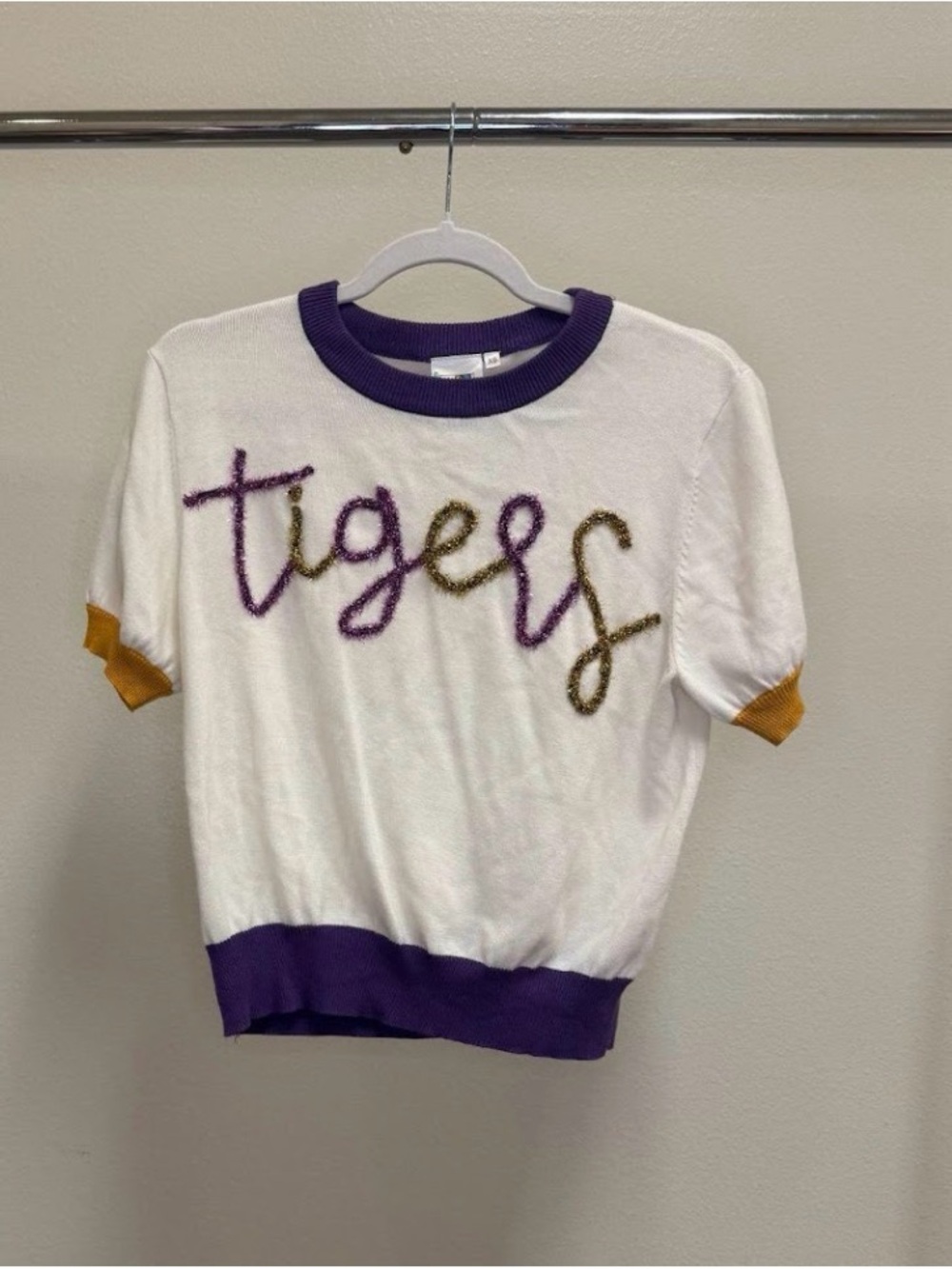 QUEEN OF SPARKLES White Short Sleeve Sweater with Purple & Gold Script